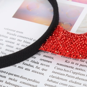 Halloween devil headband with red sequined horns and soft black velvet fabric wrap