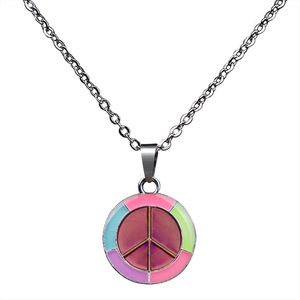 Macro detail of peace sign pendant with multicolored enamel and thermochromic finish