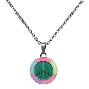 Macro detail of peace symbol pendant with colorful enamel filling on a silver chain