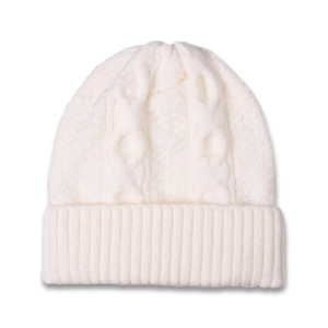 Detailed view of cream cable knit beanie with thick texture and ribbed cuff design