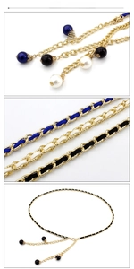Detail of gold metal chain waist belt with woven velvet ribbon and pearl pendants