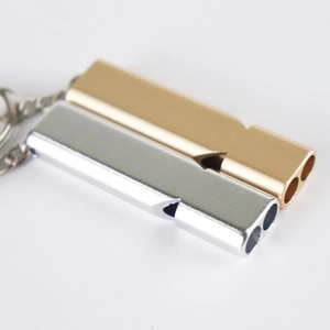 Dual-tube aluminum survival whistles in gold and silver with metal keychains for outdoors