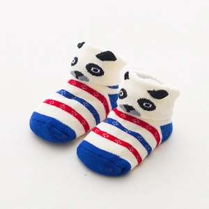 Detail of baby socks featuring red and blue stripes with a cute panda on the cuff