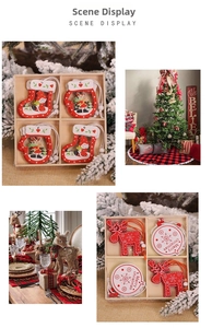 Detailed view of wood Christmas ornaments with snowman and Santa patterns in a box