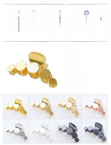 Detail view of round geometric alloy hair claws in gold, silver, and black metallic finishes