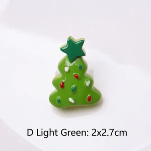 Detail of light green resin Christmas tree accessory with 2x2.7cm size specification