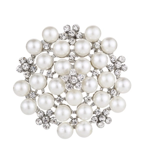 Elegant flower brooch with white pearls and sparkling rhinestones on metallic base