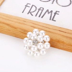 Elegant floral pearl brooch with sparkling rhinestones and silver metal finish for women