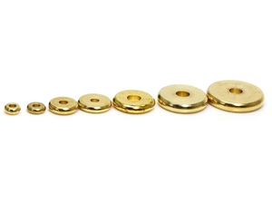 Detailed size comparison of flat solid brass spacer beads for DIY jewelry making projects