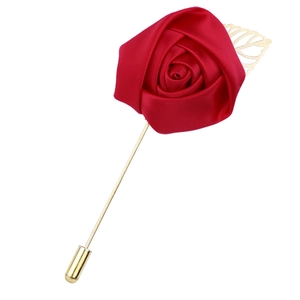 Elegant red silk rose brooch with long gold pin and decorative cutout metal leaf