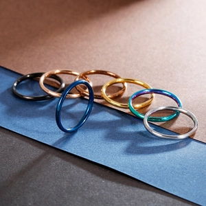 Minimalist stainless steel couple rings in multiple colors with polished mirror finish