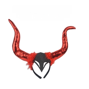 Close-up of extra-large red devil horn headband with metallic finish and feather trim
