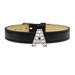 Detail of a black leather bracelet featuring a silver crystal-encrusted letter A charm