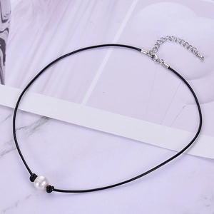 Natural freshwater pearl on black leather cord necklace with adjustable silver clasp