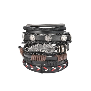 Multilayer leather bracelet featuring silver feather pendant and star studs on white background