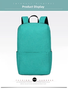 Front view of mint green casual backpack with durable fabric and zippered pocket