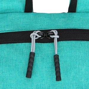 Teal canvas casual backpack with detailed black dual zipper and non-slip pulls