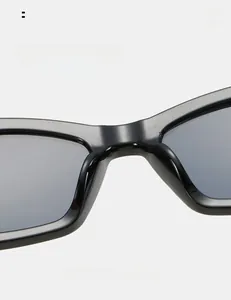 Detail view of comfortable integrated nose pads on black geometric sunglasses frames