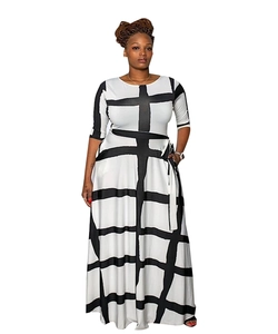 Detail view of round neck dress featuring monochrome stripe print and waist tie belt