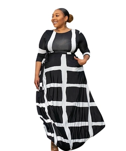 Detail showing monochrome striped pattern and hidden side pockets on the plus size dress