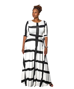 Detail of black and white checkered dress featuring a belted waist and long skirt design