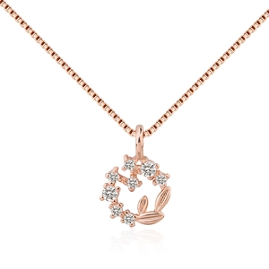 Rose gold necklace with heart-shaped floral wreath pendant and sparkling zircon stones