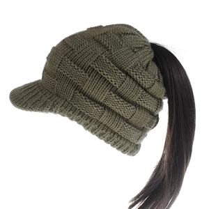 Detail showing ponytail hole design on army green knitted ponytail baseball cap