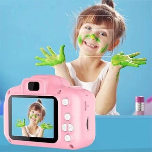 Pink digital camera for children featuring HD screen and live face detection frame