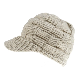Detail of off-white knitted baseball cap with textured basketweave pattern for winter