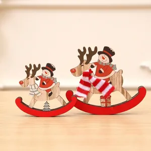 Detailed view of handcrafted wooden rocking horse with a snowman for Christmas decor