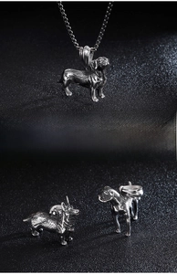 Detailed view of stainless steel Dachshund and Corgi dog pendants with vintage finish