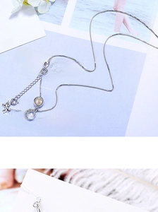 Detail of silver unicorn moon pendant necklace with box chain and lobster clasp
