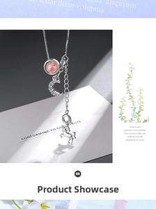 Detail of silver unicorn necklace with pink moonstone, crescent moon and horse pendant