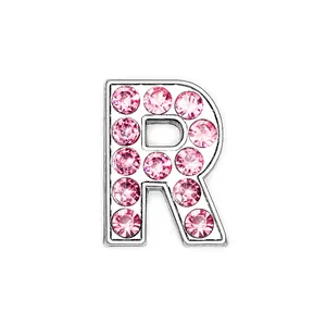 Detailed view of silver letter R pendant with sparkling pink rhinestones micro-pave setting