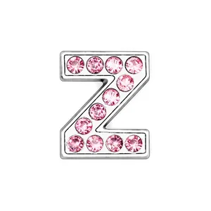 Close-up of chrome letter Z charm with pink rhinestones for DIY jewelry making