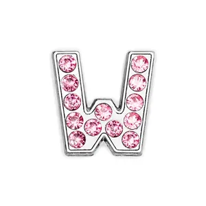 Close-up of chrome letter W charm featuring polished silver finish and pink rhinestones