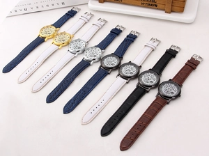Various hollow-out quartz watches with leather straps in multiple colors and finishes