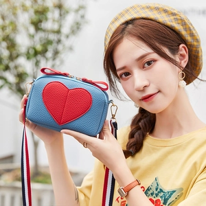 Blue lychee leather heart crossbody bag with striped shoulder strap for women