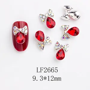 Détail de breloque ongle nœud avec pierre rouge goutte modèle LF2665 de taille 9,3x12mm