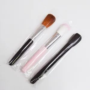 Three-piece professional makeup brush set with assorted synthetic bristles in OPP bags