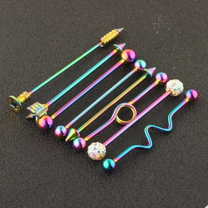 Macro view of rainbow industrial barbells with diverse ends on a black textured background
