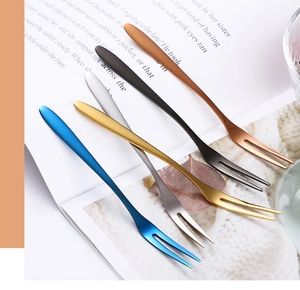 Macro detail of minimalist two-prong 304 stainless steel dessert forks in five colors