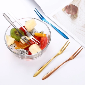 Detailed view of five colorful 304 stainless steel two-prong fruit forks in various finishes