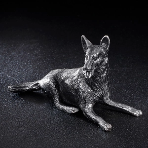 Artistic German Shepherd metal dog sculpture with a textured dark finish for home decor