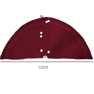 Classic 122cm burgundy knit Christmas tree skirt with cable stitch and white pom pom ties