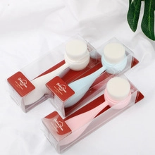 Detailed view of three silicone face brushes in white, light blue, and pink packaging