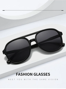 Detail of matte black aviator sunglasses with double bridge on geometric steps