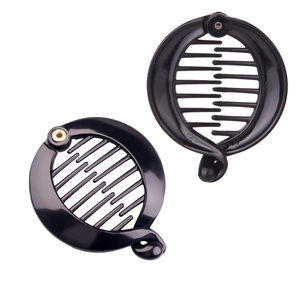Set of two black circular banana hair clips with smooth finish and dense inner teeth