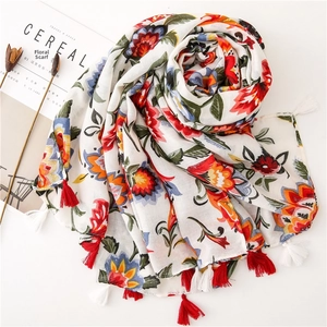 Floral print cotton linen shawl with colorful flowers and fringe for summer travel