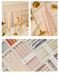 Detail of Nordic gradient scented taper candles in elegant gift box packaging